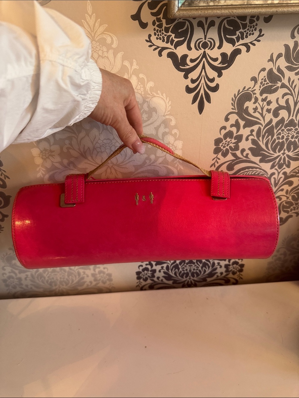 Vegan Faux Leather Mat & Nat Cylinder top handle clutch. Fuschia Pink.